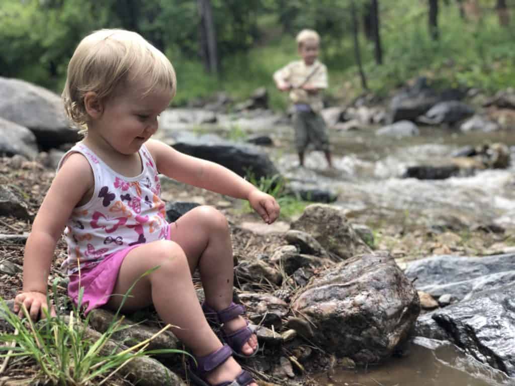 Rocks, sticks, and water = happy kids